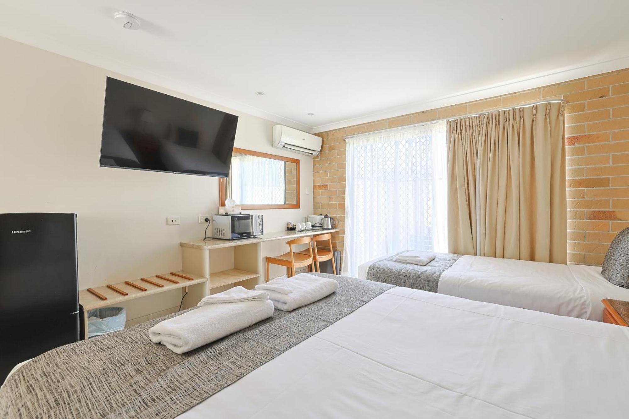 Emerald Central Palms Motel Bagian luar foto
